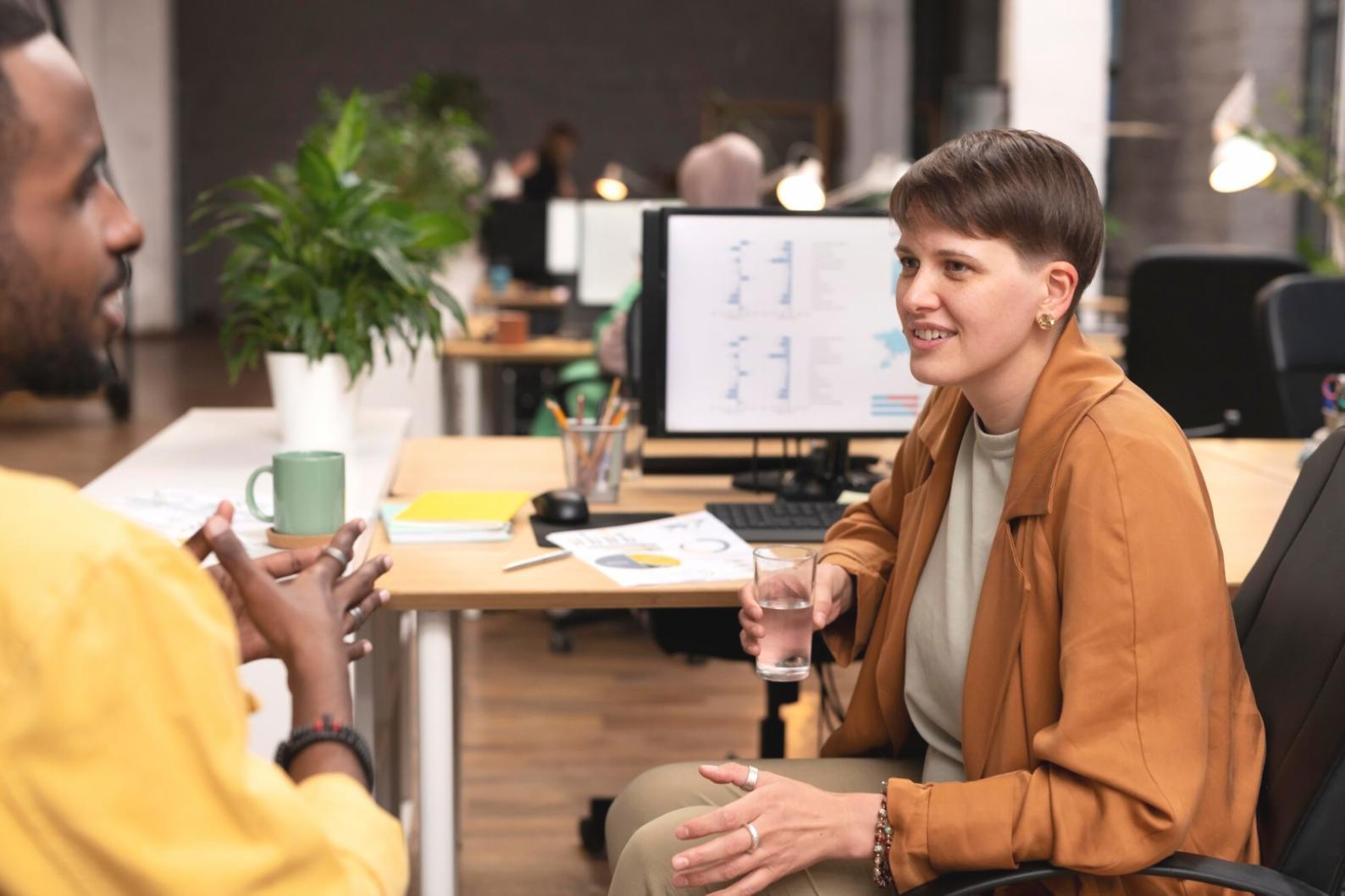 Professional team collaborating in modern office environment